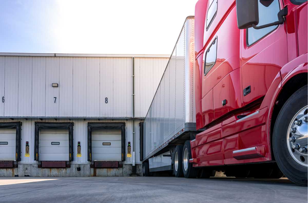 Cross Docking Specialists Behind Truck Receiving Shipment