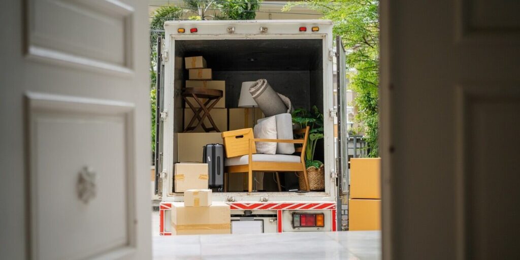 the back of a truck carrying goods moving house
