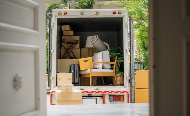 the back of a truck carrying goods moving house