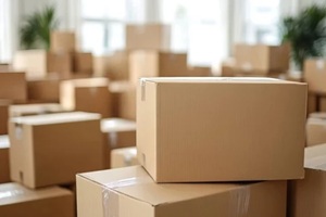 boxes are stacked high and ready to be moved or unpacked