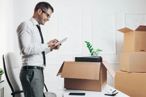 businessman moving into a new office