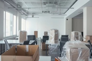 empty office space with packed boxes