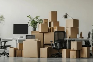 an office space completely surrounded by packed boxes ready for relocation
