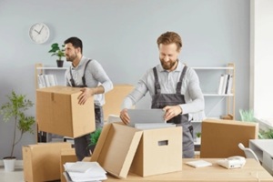 packing workers moving boxes