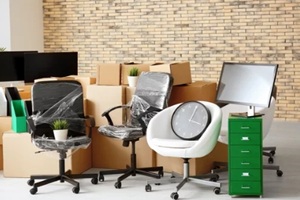 carton boxes with stuff in empty room