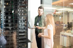 people working in a server room