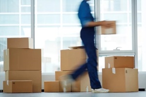 blurred image of moving professional during a corporate office move