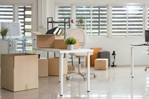 business ready to move with packed boxes