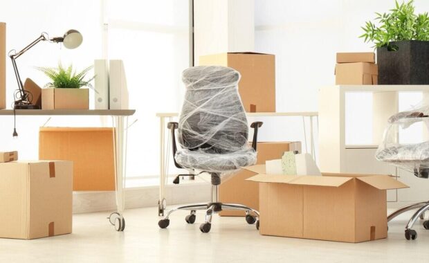 moving boxes and furniture in new office