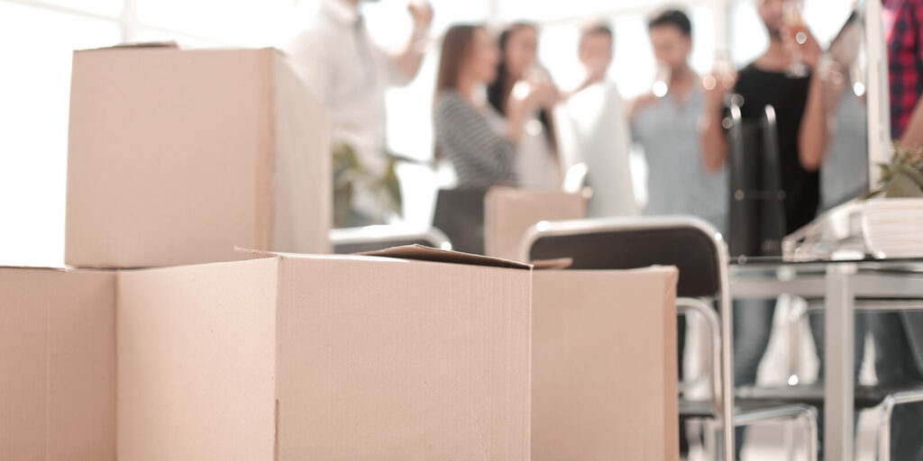 business background and cardboard boxes in the new office