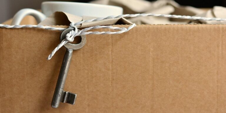 key hanging out of a box